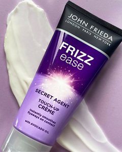 Frizz Ease Secret Agent Touch-Up Crème swatch against a purple background